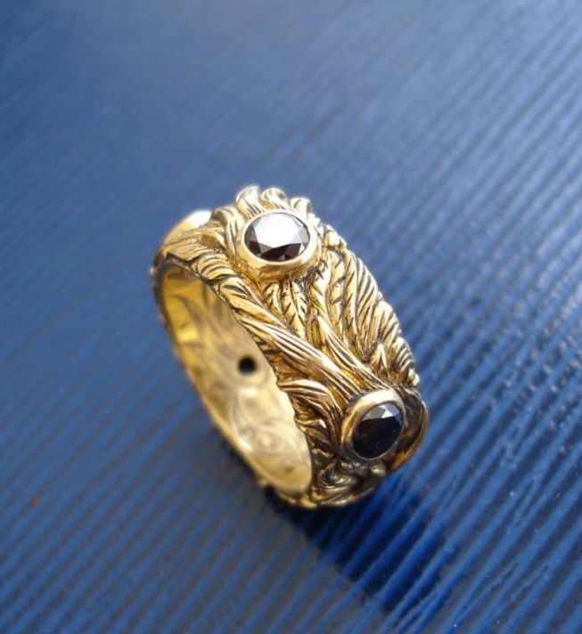Black Feather — 18k gold · black diamonds · silver