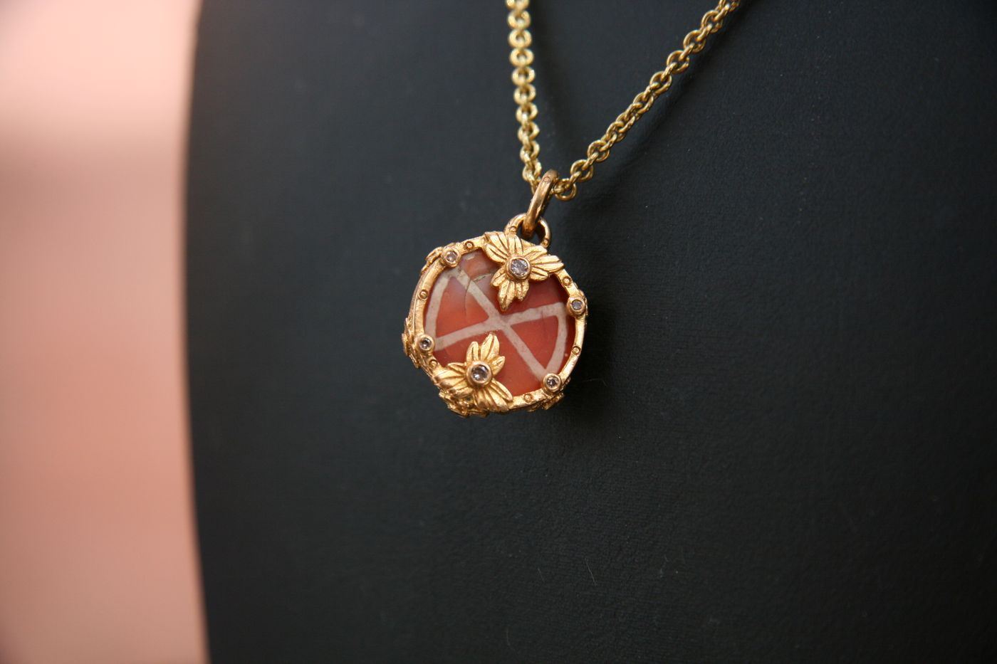 Carnelian Blossom Pendant — Carnelian, diamonds, gold flowers