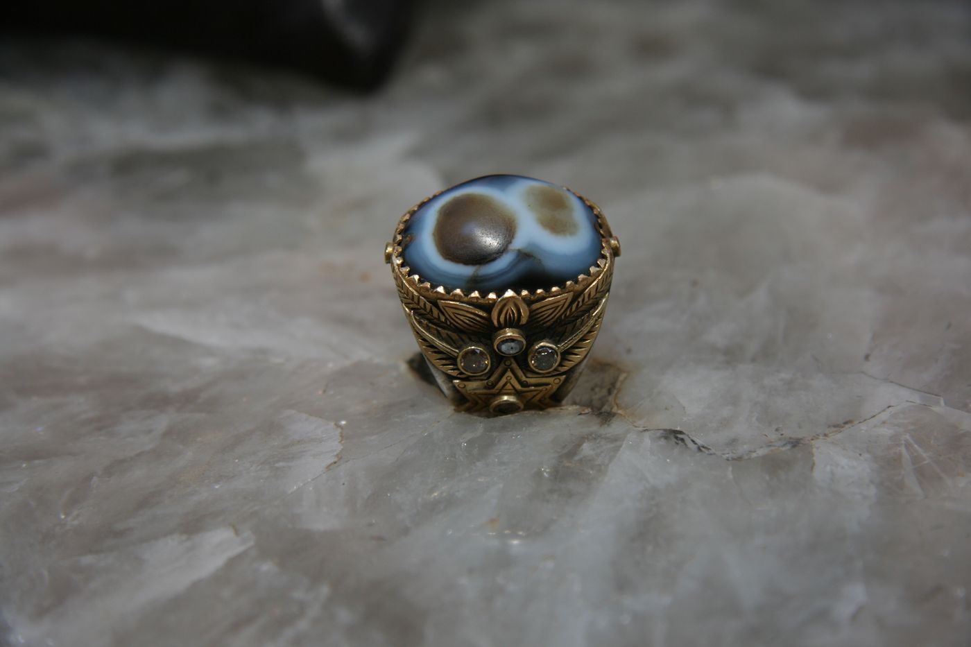 Eye-Agate Figure-8 Ring — Banded agate, carved gold leaf