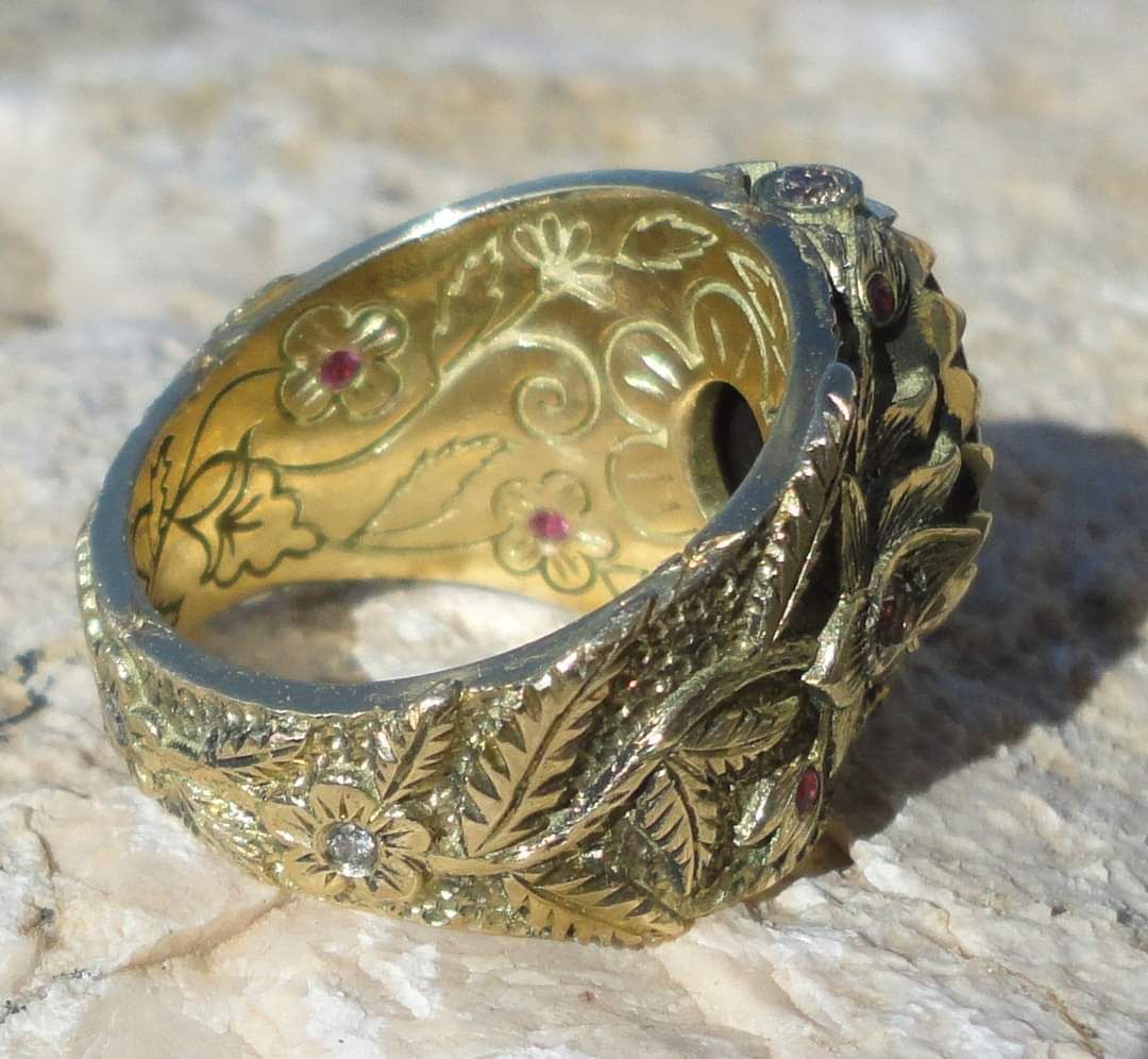 The Foliate — 18k gold · rubies · diamond