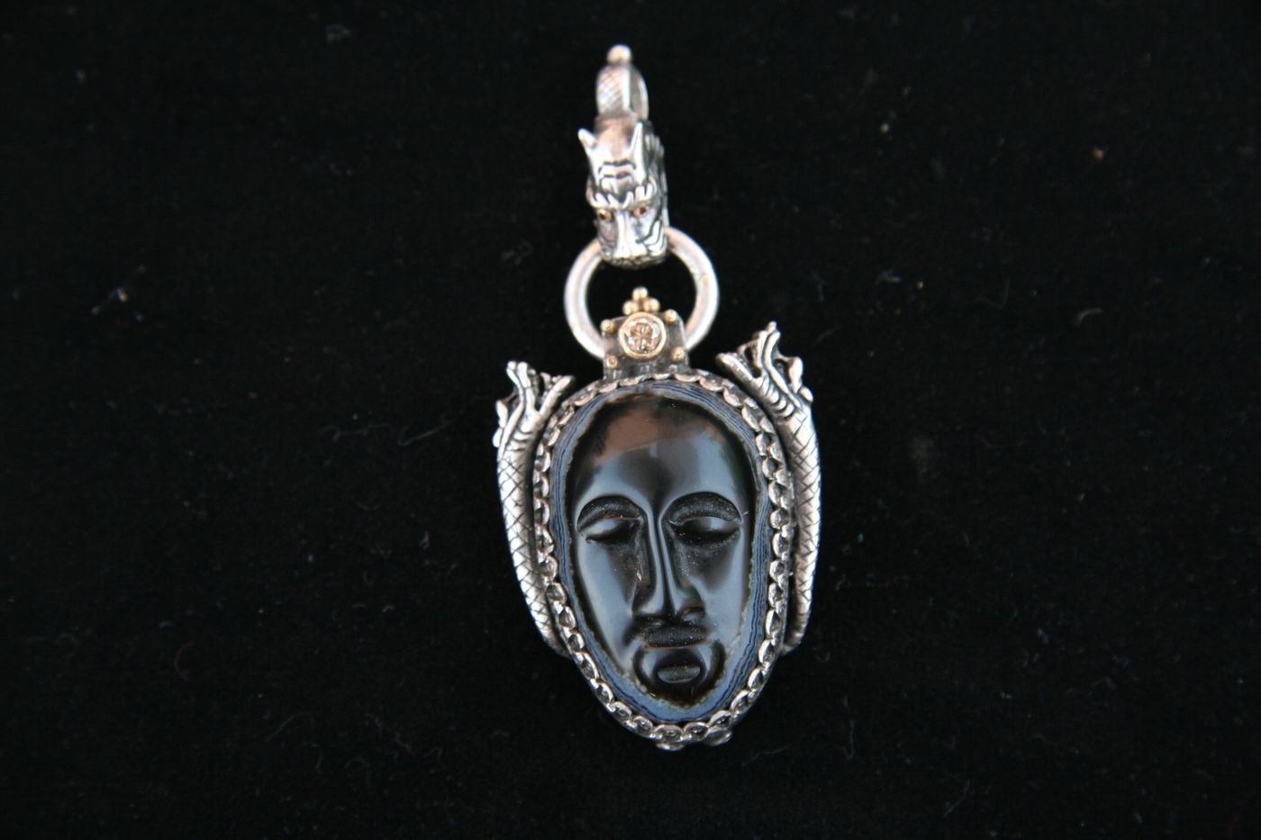 The Sleeping Face — Carved black agate · ruby · silver & gold