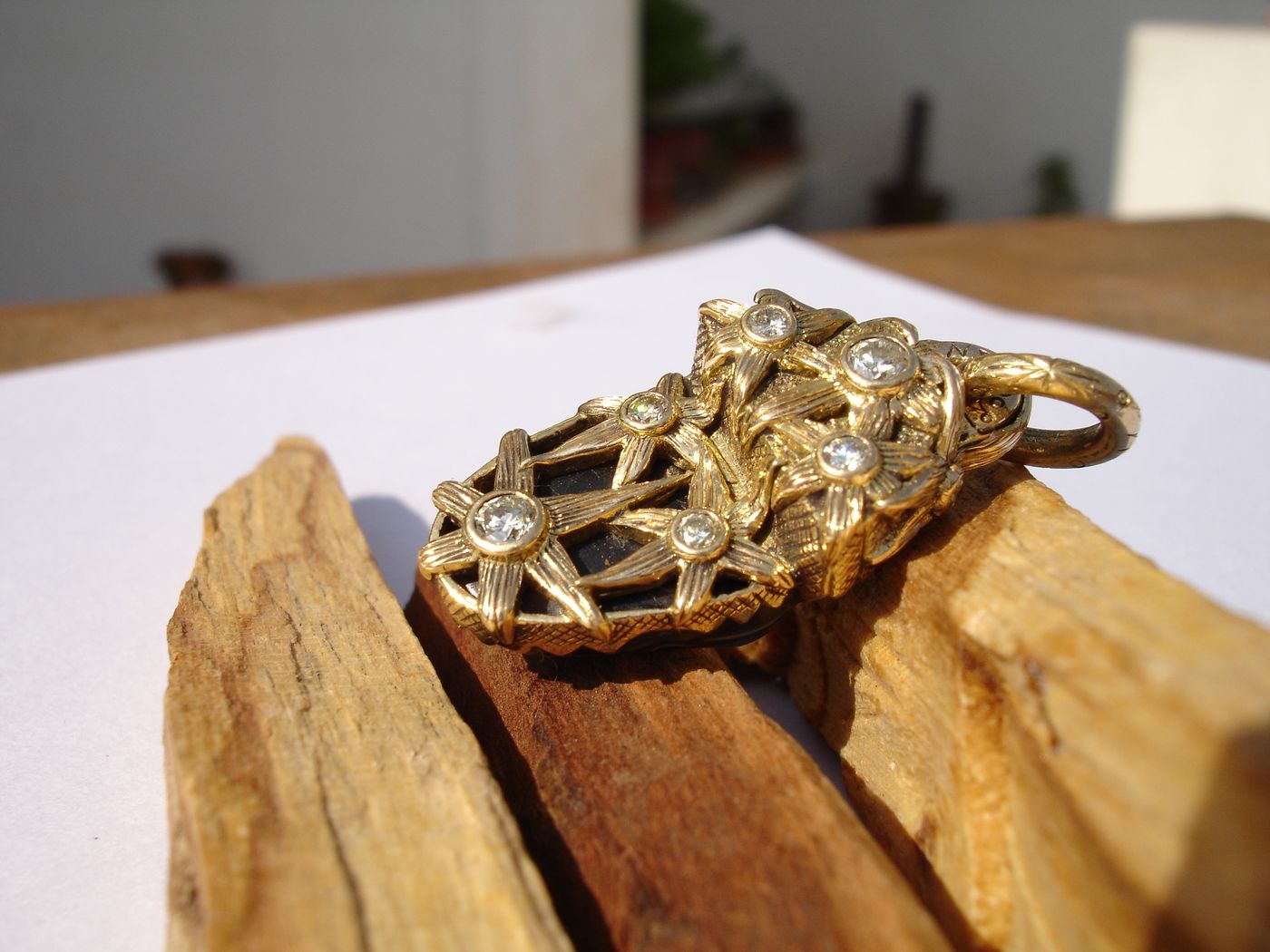 Openwork Diamond Buckle — Black onyx, diamonds, gold lattice