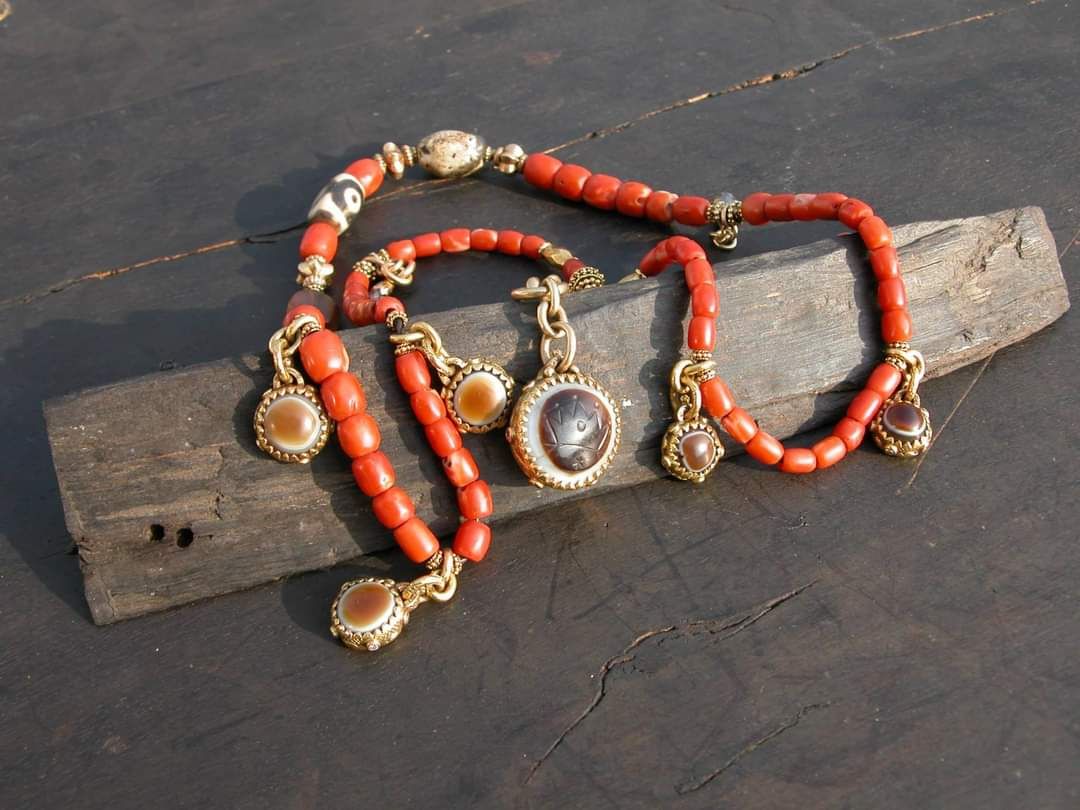 The Talisman — Antique coral · banded agate · dzi bead · gold