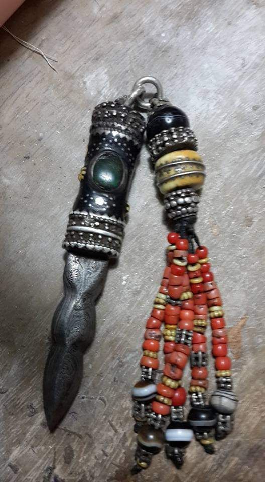 The Dagger — Damascus steel · silver · green stone · antique coral · bone beads