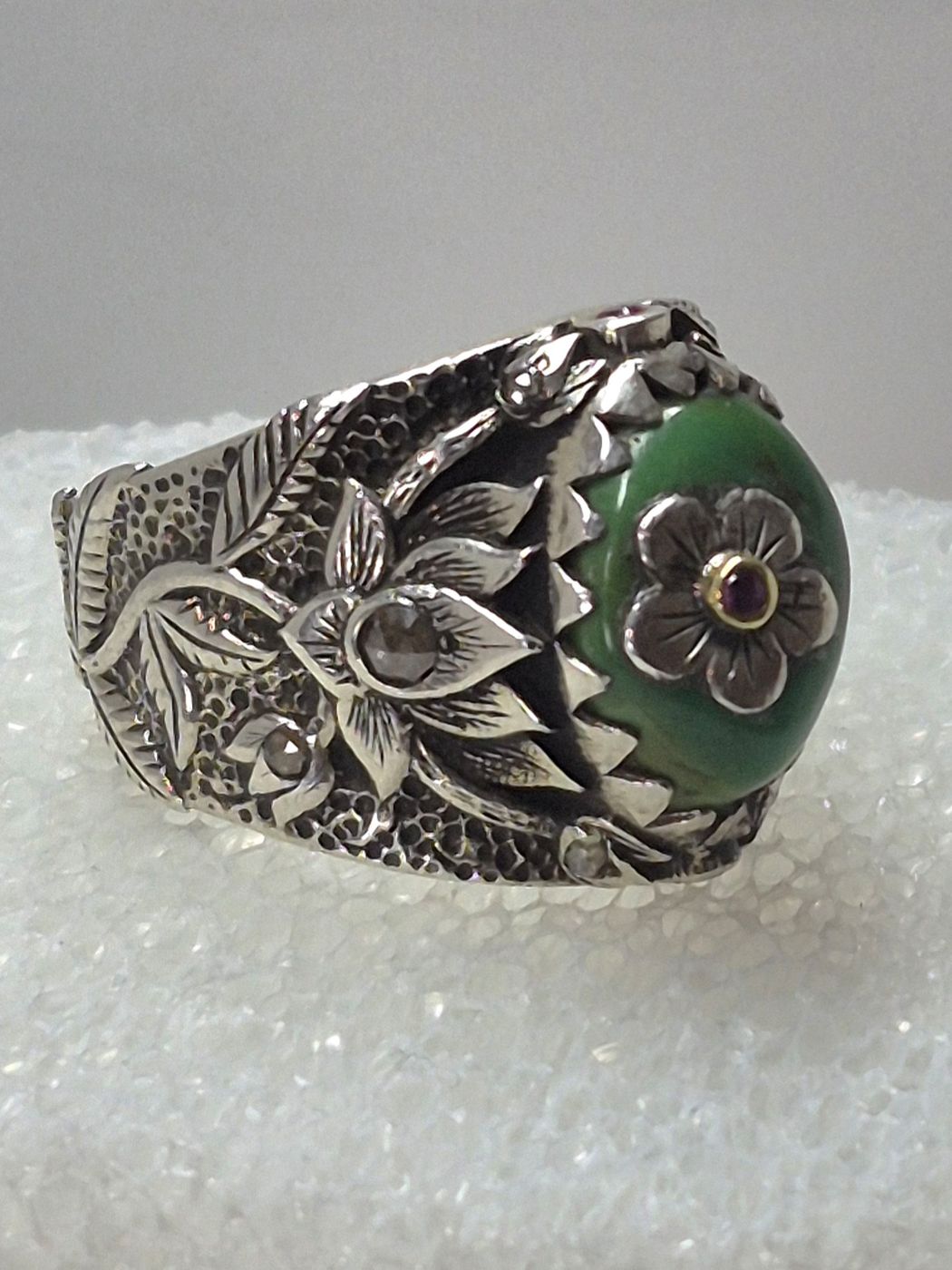 The Autumn Ring — Hand-carved sterling silver · gold · green turquoise · rubies · rose-cut diamonds