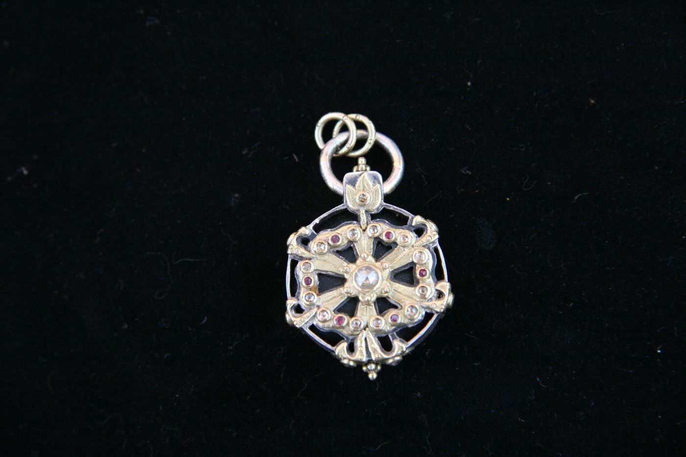 Wheel Medallion — Rubies, rose-cut diamonds, silver & gold