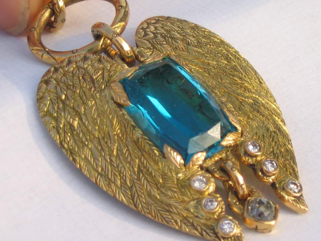 Winged Light — 18k gold · blue topaz · diamonds · coral